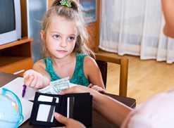 Young student harasses her parents for money for good grades